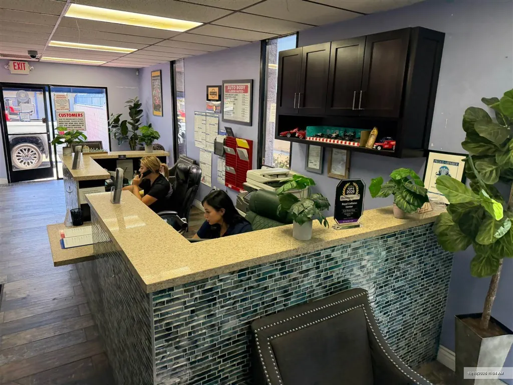 Service advisors at the front desk of Royal Collision Center, Fontana, CA